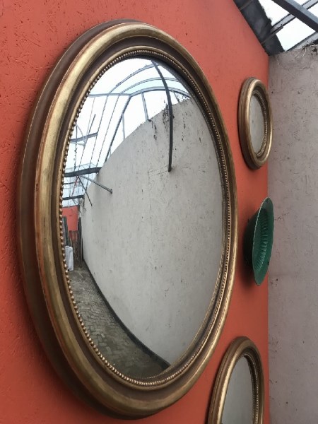 Round golden mirror