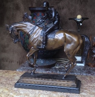 bronze jockey on horse