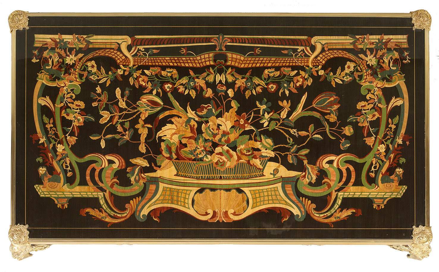 A representative French Louis XV Style bureau plat rich marquetey